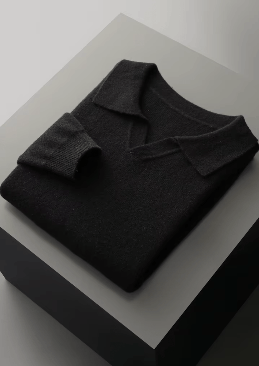 MERINO WOOL RIBBED BUTTONLESS POLO