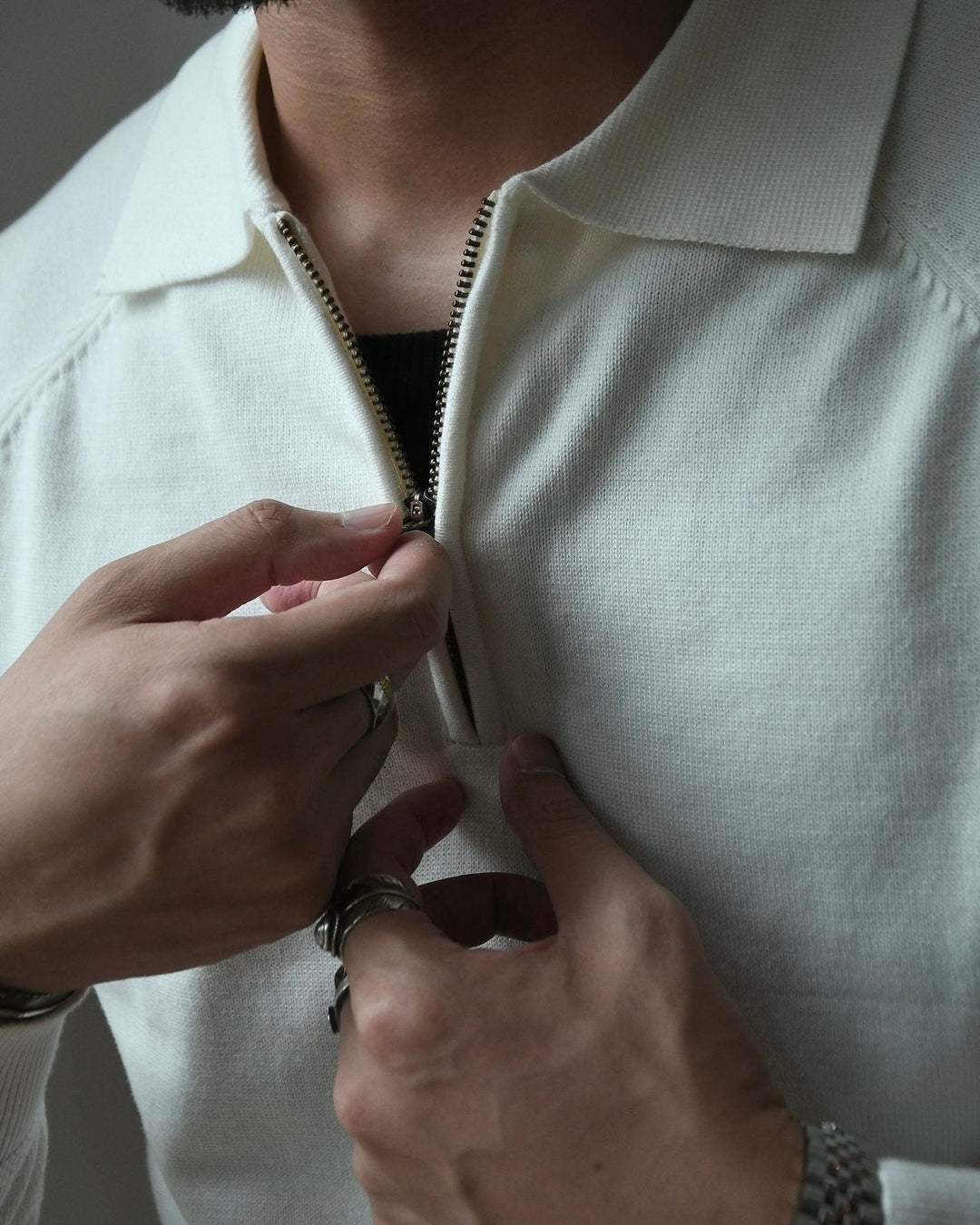 MONOCHROME RAGLAN QUARTER-ZIP KNIT POLO